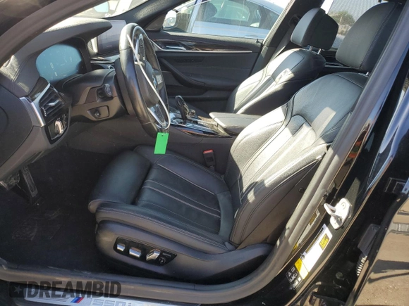 2019 BMW 5 Series M550i xDrive with VIN WBAJB9C50KB464503, listed as a Copart auction lot 56995825 with 67,324 mi miles and Salvage title. Bid and sale history available at DreamBid. Image 7.