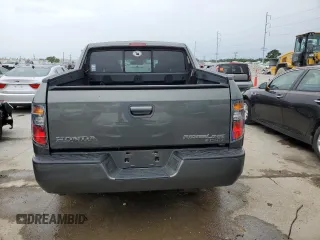 2007 Honda Ridgeline RTL z VIN 2HJYK16577H511325, wystawiony jako Copart lot #57619725 z przebiegiem 161 037 mil mil oraz Szkoda całkowita • Salvage title. Historia ofert i sprzedaży dostępna na DreamBid. Obrazek 6.