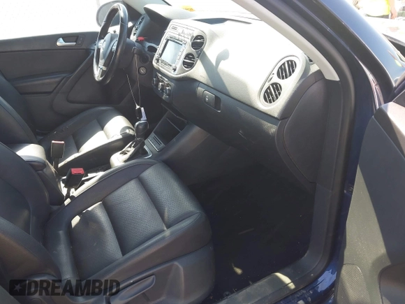 2012 Volkswagen Tiguan S with VIN WVGBV7AX2CW566981, listed as a IAAI auction lot 42069748 with 153,613 mi miles and . Bid and sale history available at DreamBid. Image 5.