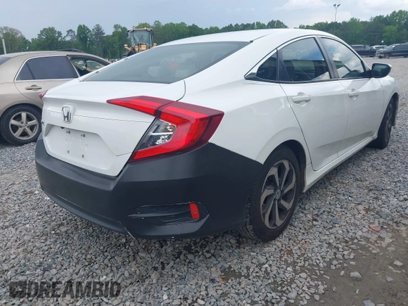 2017 Honda Civic LX with VIN 19XFC2F58HE010262, listed as a IAAI auction lot 42118124 with 125,535 mi miles and . Bid and sale history available at DreamBid. Image 4.