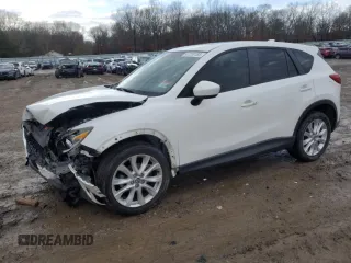 2013 Mazda CX-5 Grand Touring with VIN JM3KE2DEXD0133292, listed as a Copart auction lot 47210185 with 130,893 mi miles and Clean Title. Bid and sale history available at carsss.com. Image 1.