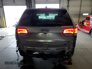 2015 Jeep Grand Cherokee High Altitude with VIN 1C4RJECG7FC781715, listed as a Copart auction lot 73321744 with 0 mi miles and Salvage Title. Bid and sale history available at carsss.com. Image 6.