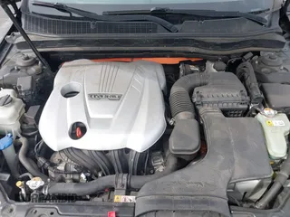 2015 Kia Optima Hybrid EX with VIN KNAGN4ADXF5080070, listed as a IAAI auction lot 41666446 with 119,845 mi miles. Bid and sale history available at carsss.com. Image 10.