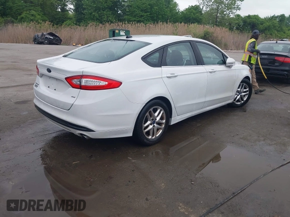 2013 Ford Fusion SE with VIN 3FA6P0H76DR106133, listed as a IAAI auction lot 42180076 with 199,398 mi miles and . Bid and sale history available at DreamBid. Image 4.