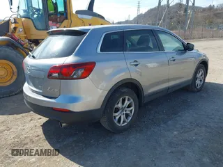 2015 Mazda CX-9 Sport with VIN JM3TB2BA6F0455539, listed as a IAAI auction lot 41839466 with 143,667 mi miles and . Bid and sale history available at carsss.com. Image 4.