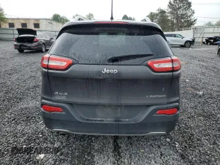 2016 Jeep Cherokee Limited with VIN 1C4PJMDBXGW261559, listed as a Copart auction lot 60042415 with 94,637 mi miles and Salvage title. Bid and sale history available at DreamBid. Image 6.