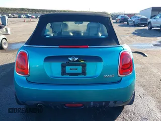 2016 MINI Convertible z VIN WMWWG5C50G3C19656, wystawiony jako IAAI lot #41429611 z przebiegiem 60 873 mil mil oraz . Historia ofert i sprzedaży dostępna na DreamBid. Obrazek 17.