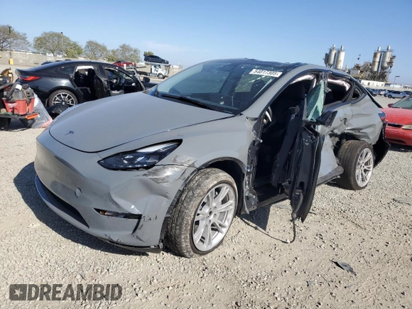 2024 Tesla Model Y Long Range with VIN 7SAYGDEE1RA245642, listed as a Copart auction lot 55490385 with Not provided miles and Salvage title. Bid and sale history available at DreamBid. Image 1.