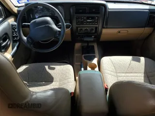 2001 Jeep Cherokee Sport with VIN 1J4FT48S21L538823, listed as a Copart auction lot 56385885 with 157,808 mi miles and Clean title. Bid and sale history available at DreamBid. Image 8.