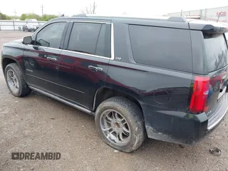 2016 Chevrolet Tahoe LTZ with VIN 1GNSKCKC7GR171904, listed as a IAAI auction lot 41967060 with 223,334 mi miles and . Bid and sale history available at DreamBid. Image 3.
