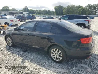 2012 Volkswagen Jetta SE with VIN 3VWDX7AJ3CM114196, listed as a Copart auction lot 61236545 with 128,893 mi miles and Salvage title. Bid and sale history available at DreamBid. Image 2.