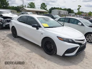 2023 Toyota Camry SE z VIN 4T1G11AK0PU752118, wystawiony jako IAAI lot #42394609 z przebiegiem 38 772 mil mil oraz . Historia ofert i sprzedaży dostępna na DreamBid. Obrazek 1.