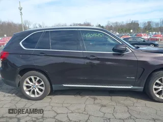 2014 BMW X5 xDrive35i with VIN 5UXKR0C57E0H20944, listed as a IAAI auction lot 42011451 with 208,205 mi miles. Bid and sale history available at carsss.com. Image 13.