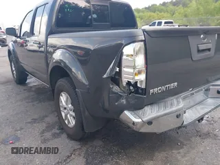 2015 Nissan Frontier SV with VIN 1N6AD0EV6FN751948, listed as a IAAI auction lot 42063935 with 52,244 mi miles and . Bid and sale history available at DreamBid. Image 6.