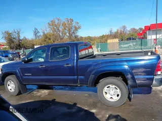 2013 Toyota Tacoma with VIN 3TMMU4FN4DM052928, listed as a IAAI auction lot 40846879 with 113,928 mi miles. Bid and sale history available at carsss.com. Image 14.