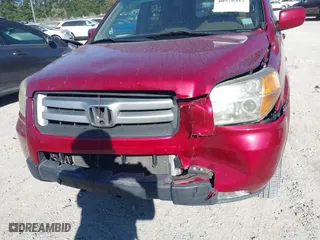 2006 Honda Pilot EX-L with VIN 5FNYF18566B022909, listed as a IAAI auction lot 40576412 with 310,278 mi miles. Bid and sale history available at carsss.com. Image 6.