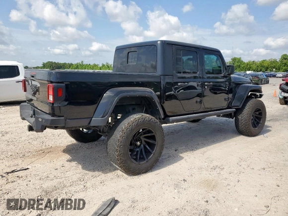 2021 Jeep Gladiator Freedom with VIN 1C6HJTAG8ML580882, listed as a Copart auction lot 57690885 with Not provided miles and Salvage title. Bid and sale history available at DreamBid. Image 3.