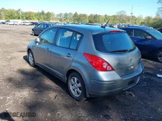 2012 Nissan Versa S with VIN 3N1BC1CP2CK804329, listed as a IAAI auction lot 39366678 with 167,539 mi miles. Bid and sale history available at carsss.com. Image 3.