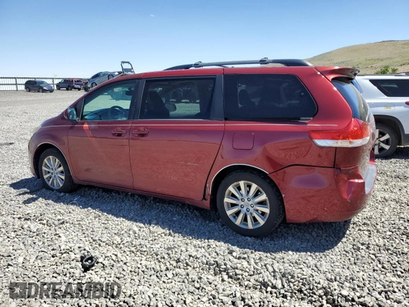 2012 Toyota Sienna XLE with VIN 5TDDK3DC0CS041425, listed as a Copart auction lot 60286305 with 214,634 mi miles and Salvage title. Bid and sale history available at DreamBid. Image 2.