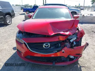 2016 Mazda Mazda6 i Touring with VIN JM1GJ1V5XG1420598, listed as a IAAI auction lot 42054889 with 90,556 mi miles. Bid and sale history available at carsss.com. Image 12.