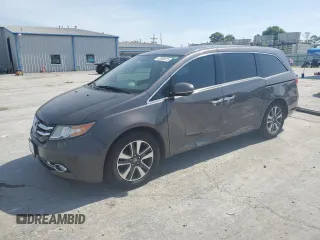 2015 Honda Odyssey Touring Elite with VIN 5FNRL5H99FB050095, listed as a Copart auction lot 62096815 with 161,501 mi miles and Salvage title. Bid and sale history available at DreamBid. Image 1.