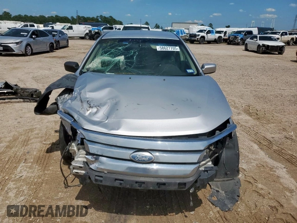 2012 Ford Fusion SE z VIN 3FAHP0HG8CR145183, wystawiony jako Copart lot #58627705 z przebiegiem 236 148 mil mil oraz Szkoda całkowita • Salvage title. Historia ofert i sprzedaży dostępna na DreamBid. Obrazek 5.