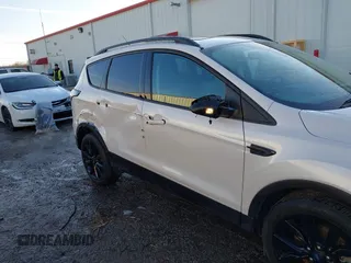 2017 Ford Escape Titanium with VIN 1FMCU9J93HUE96611, listed as a IAAI auction lot 41546906 with 90,586 mi miles. Bid and sale history available at carsss.com. Image 6.