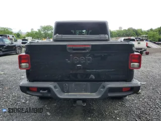 2021 Jeep Gladiator Sport S with VIN 1C6JJTAG4ML583148, listed as a Copart auction lot 59790835 with 48,623 mi miles and Salvage title. Bid and sale history available at DreamBid. Image 6.