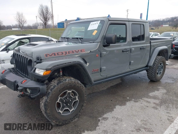 2022 Jeep Gladiator Mojave z VIN 1C6JJTEG8NL130971, wystawiony jako IAAI lot #41163074 z przebiegiem 47 142 mil mil oraz . Historia ofert i sprzedaży dostępna na DreamBid. Obrazek 21.