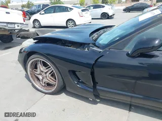 2002 Chevrolet Corvette with VIN 1G1YY22G525105391, listed as a IAAI auction lot 42041878 with 175,128 mi miles. Bid and sale history available at carsss.com. Image 19.