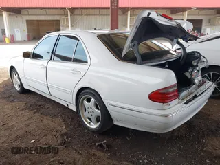 2001 Mercedes-Benz E-Class with VIN WDBJF65J61B183965, listed as a IAAI auction lot 41926279 with 305,436 mi miles. Bid and sale history available at carsss.com. Image 3.