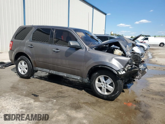 2012 Ford Escape XLS z VIN 1FMCU9C75CKB46512, wystawiony jako Copart lot #50629455 z przebiegiem Nie podano mil oraz Nie do naprawy • Non repairable. Historia ofert i sprzedaży dostępna na DreamBid. Obrazek 4.