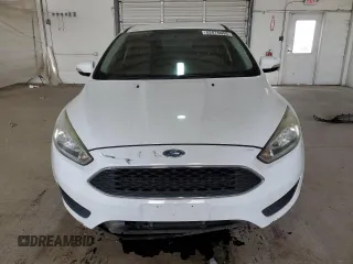 2016 Ford Focus SE z VIN 1FADP3F26GL404670, wystawiony jako Copart lot #52876095 z przebiegiem 80 425 mil mil oraz Szkoda całkowita • Salvage title. Historia ofert i sprzedaży dostępna na DreamBid. Obrazek 5.