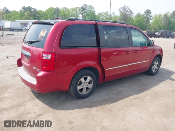 2010 Dodge Grand Caravan SXT with VIN 2D4RN5D17AR145958, listed as a IAAI auction lot 42125450 with 229,790 mi miles and . Bid and sale history available at DreamBid. Image 4.