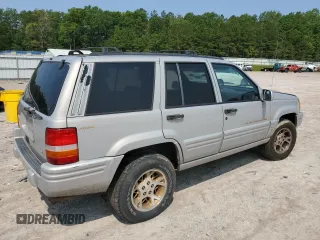 1998 Jeep Grand Cherokee Limited with VIN 1J4GZ78Y5WC324828, listed as a Copart auction lot 58992125 with 225,705 mi miles and Salvage title. Bid and sale history available at DreamBid. Image 3.