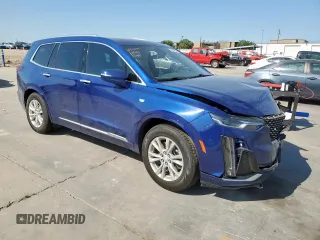 2023 Cadillac XT6 FWD Luxury z VIN 1GYKPAR42PZ167668, wystawiony jako Copart lot #53278075 z przebiegiem 32 212 mil mil oraz Szkoda całkowita • Salvage title. Historia ofert i sprzedaży dostępna na DreamBid. Obrazek 4.