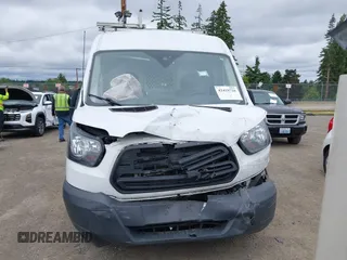 2018 Ford Transit Cargo z VIN 1FTYR2CGXJKB29432, wystawiony jako IAAI lot #42419726 z przebiegiem 80 543 mil mil oraz . Historia ofert i sprzedaży dostępna na DreamBid. Obrazek 12.