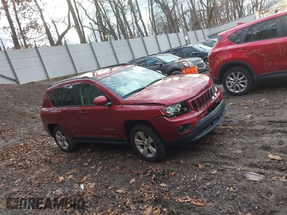 2016 Jeep Compass High Altitude with VIN 1C4NJDEB0GD779584, listed as a IAAI auction lot 41209135 with 143,624 mi miles and . Bid and sale history available at DreamBid. Image 13.
