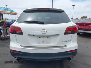 2015 Mazda CX-9 Grand Touring z VIN JM3TB2DV9F0458340, wystawiony jako IAAI lot #42021843 z przebiegiem 145 929 mil mil oraz . Historia ofert i sprzedaży dostępna na DreamBid. Obrazek 17.