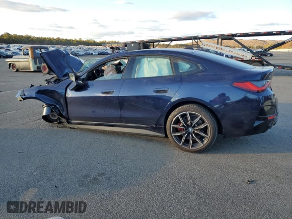 2023 BMW i4 M50 with VIN WBY33AW08PFP06513, listed as a Copart auction lot 87903685 with 0 mi miles and Salvage Title. Bid and sale history available at carsss.com. Image 2.