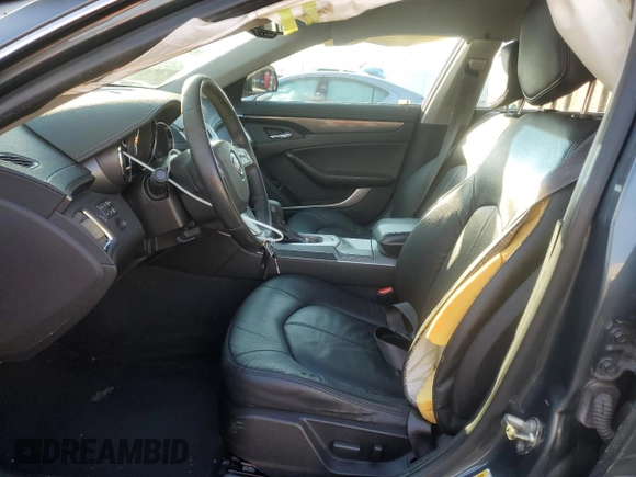 2010 Cadillac CTS with VIN 1G6DA5EG0A0133864, listed as a Copart auction lot 42970405 with 123,946 mi miles and Salvage Title. Bid and sale history available at DreamBid. Image 7.