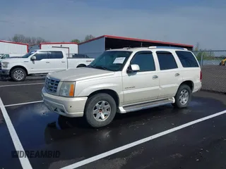 2005 Cadillac Escalade z VIN 1GYEC63T55R114823, wystawiony jako IAAI lot #41931065 z przebiegiem Nie podano mil oraz . Historia ofert i sprzedaży dostępna na DreamBid. Obrazek 2.