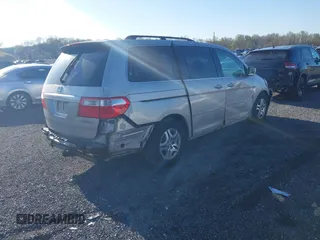 2005 Honda Odyssey EX with VIN 5FNRL38445B411188, listed as a IAAI auction lot 42060307 with 240,688 mi miles. Bid and sale history available at carsss.com. Image 4.