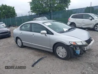 2007 Honda Civic z VIN JHMFA36237S015252, wystawiony jako IAAI lot #42240684 z przebiegiem 162 840 mil mil oraz . Historia ofert i sprzedaży dostępna na DreamBid. Obrazek 1.