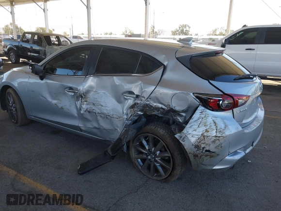 2018 Mazda 3 Touring with VIN 3MZBN1L31JM163466, listed as a IAAI auction lot 40777124 with 101,497 mi miles and . Bid and sale history available at carsss.com. Image 3.