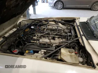 1989 Jaguar XJS z VIN SAJNV4847KC164497, wystawiony jako Copart lot #87258504 z przebiegiem 90 299 mil mil oraz Szkody całkowita. Historia ofert i sprzedaży dostępna na DreamBid. Obrazek 12.