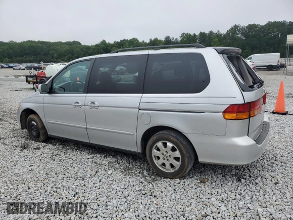 2004 Honda Odyssey EX-L with VIN 5FNRL18044B069774, listed as a Copart auction lot 57096535 with 165,307 mi miles and Salvage title. Bid and sale history available at DreamBid. Image 2.