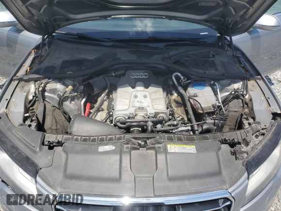 2014 Audi A7 Premium Plus z VIN WAUWGAFCXEN037853, wystawiony jako Copart lot #54741855 z przebiegiem 162 927 mil mil oraz Szkoda całkowita • Salvage title. Historia ofert i sprzedaży dostępna na DreamBid. Obrazek 11.