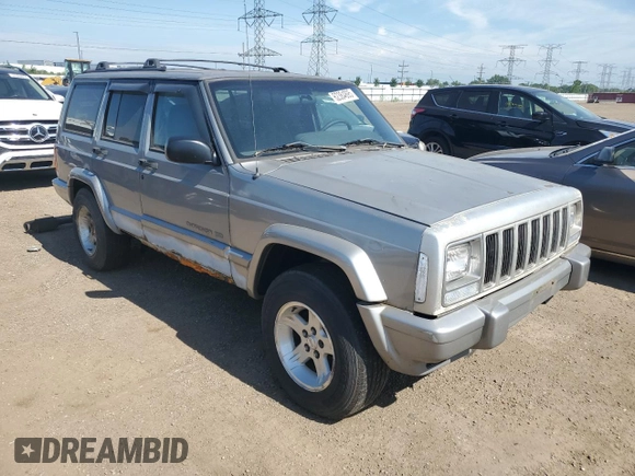2001 Jeep Cherokee Sport z VIN 1J4FF58S61L540796, wystawiony jako Copart lot #62384895 z przebiegiem 209 294 mil mil oraz Czysty tytuł • Clean title. Historia ofert i sprzedaży dostępna na DreamBid. Obrazek 4.