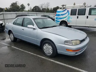 1994 Toyota Camry LE with VIN 4T1SK12E8RU411682, listed as a Copart auction lot 44153535 with 214,022 mi miles and Salvage Title. Bid and sale history available at carsss.com. Image 4.